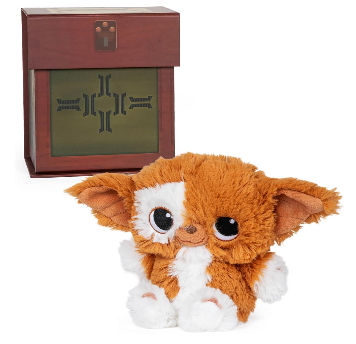 Soft Gizmo plush inspired by Gremlins with big eyes, sitting in front of a collectible themed box keepsake