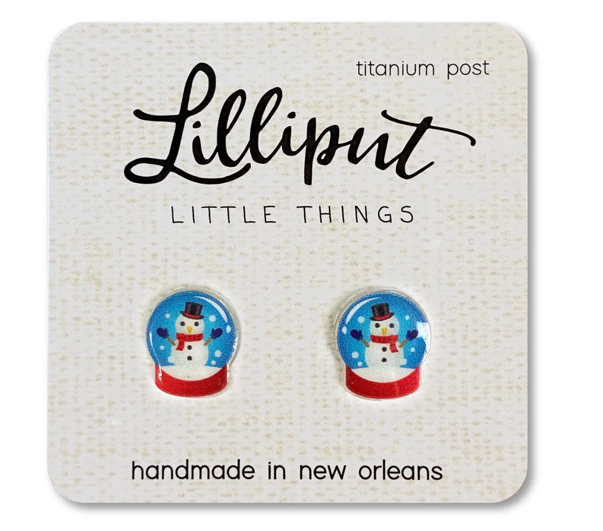 Small snowman inside colorful snow globe stud earrings on branded display card for sensitive ears