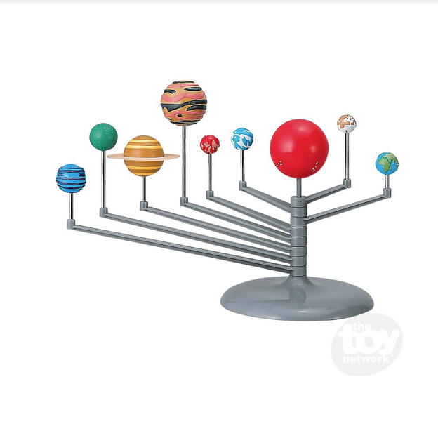 Miniature model of the solar system with colorful planets mounted on a rotating stand for educational fun.
