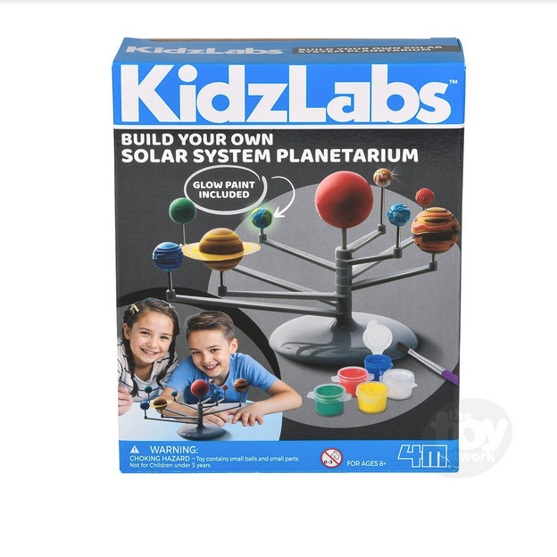 KidzLabs solar system model kit with planets, glow paint, and children assembling the planetarium together on a table