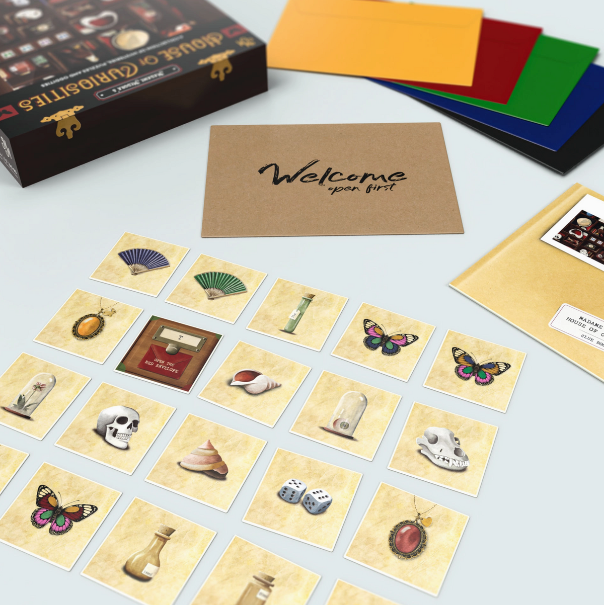 Madame Medora's House of Curiosities game cards and welcome note with vintage curiosities