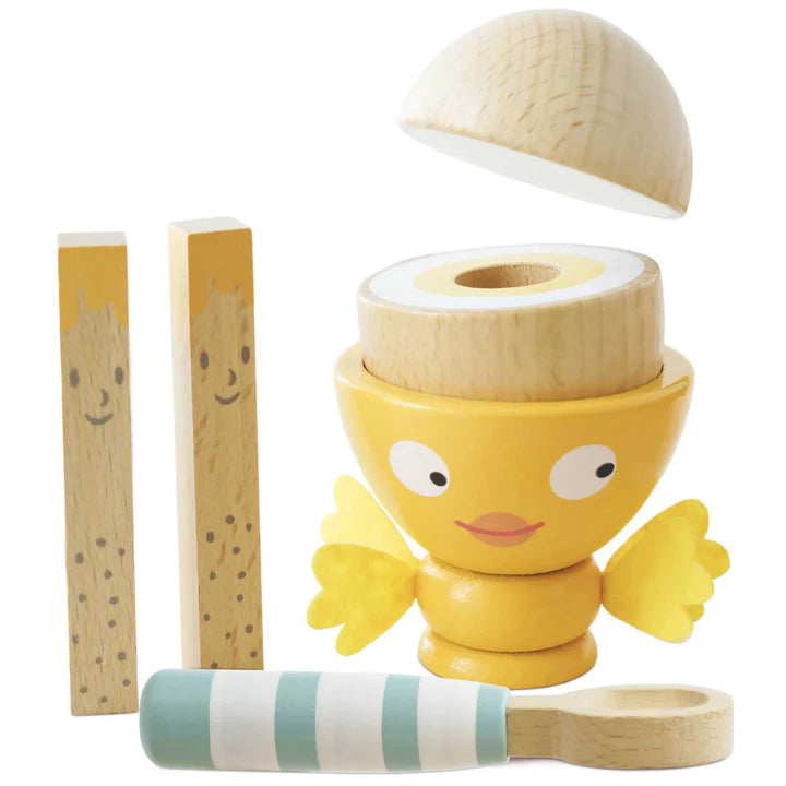 Egg Cup wooden set with magnetic egg, hand painted soldiers, wooden spoon, and felt wings for imaginative play.