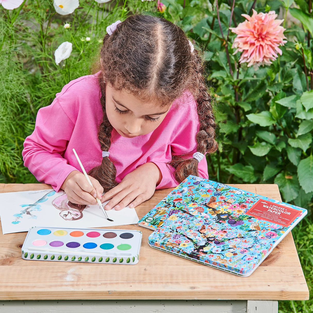 Watercolor Pad | Tree of Life with extra thick Italian paper beside a girl painting outdoors with watercolors.