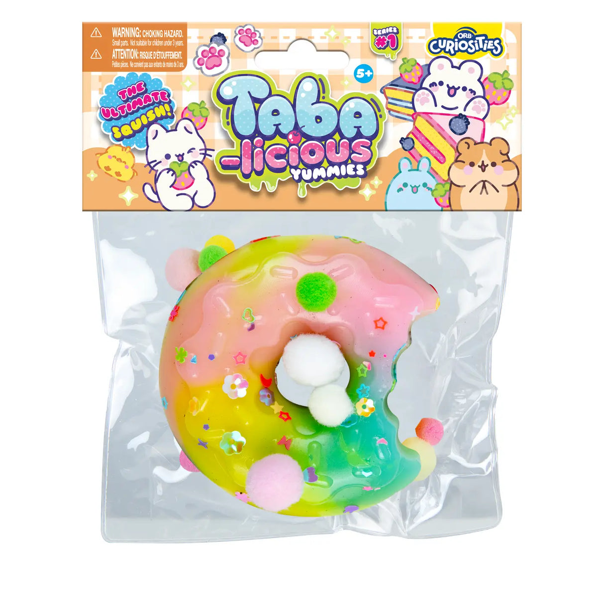 Taba-licious Mega Yummies Squishy colorful donut-shaped soft silicone squishy with sprinkles and foam balls in packaging.