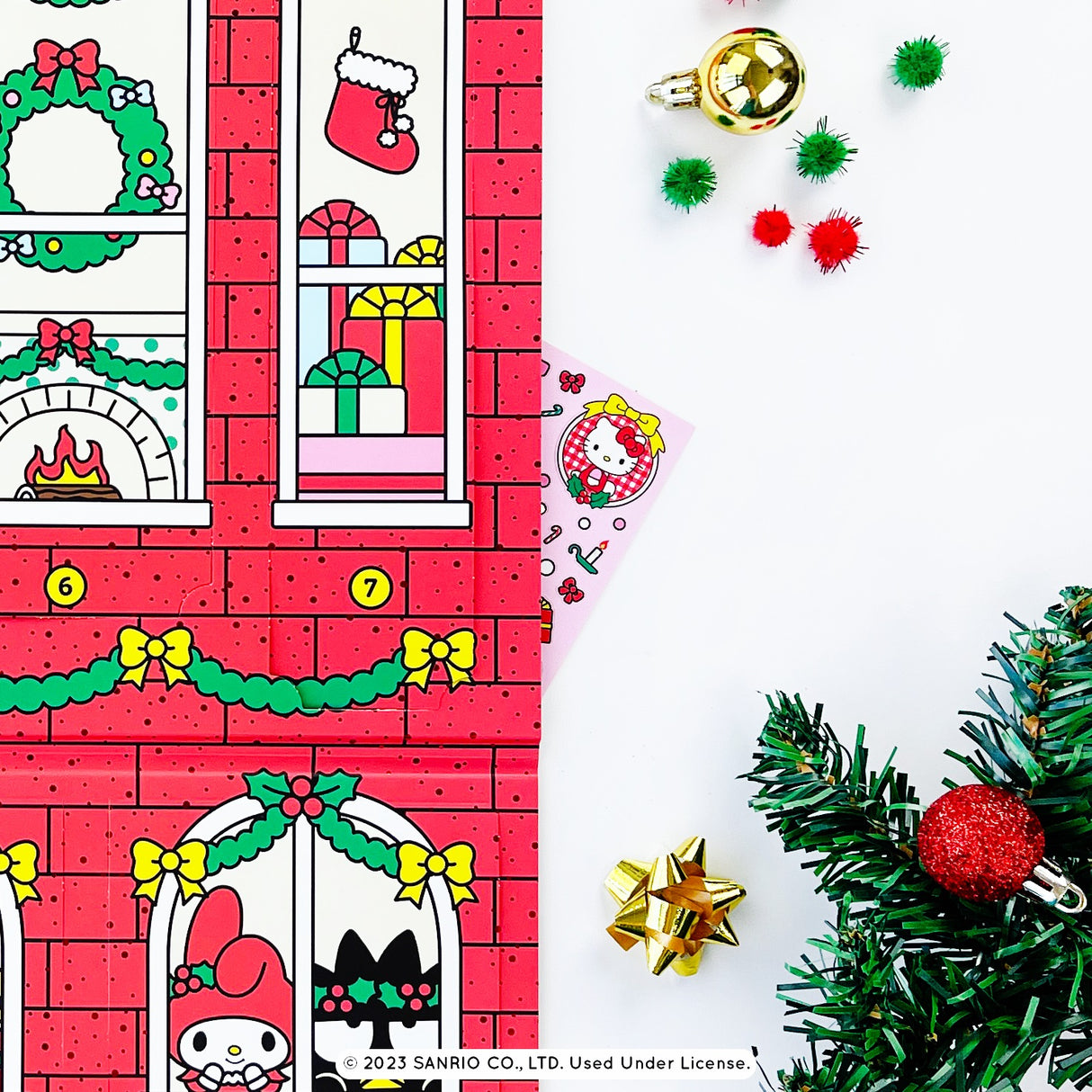 Hello Kitty And Friends Christmas Sticker Advent Calendar with festive red brick design, countdown flaps, and holiday decorations.