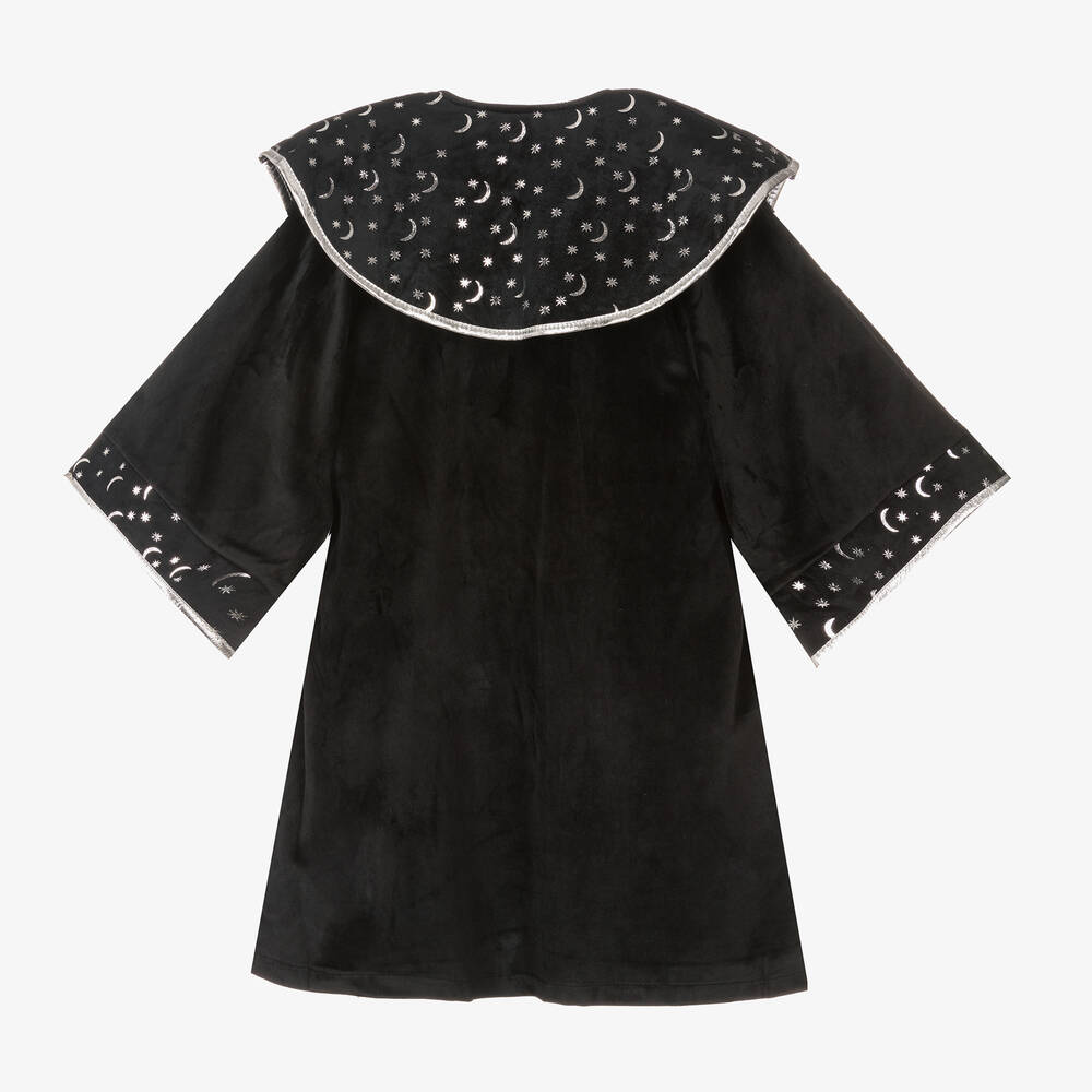 Back view of a black wizard coat with crescent moon and star patterns on collar and sleeves for kids.