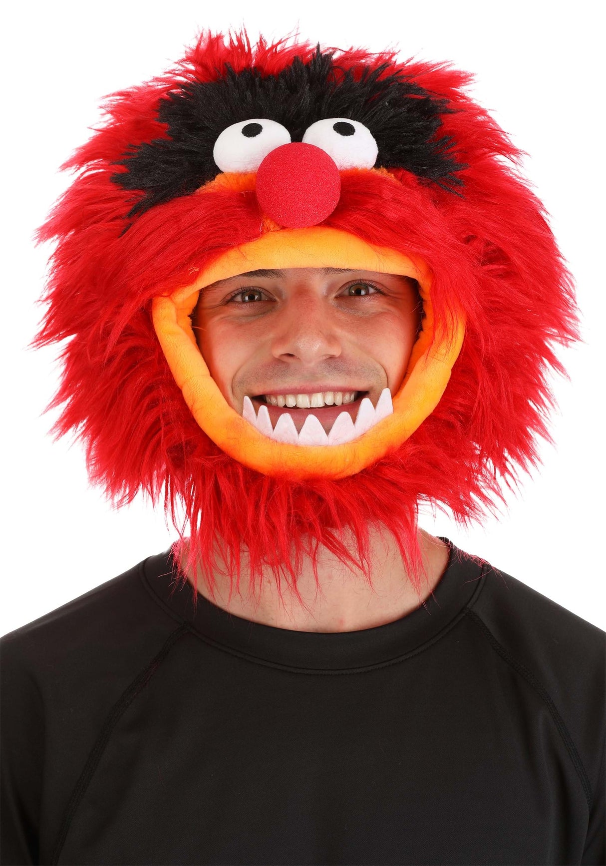 Man wearing The Muppet Show Animal Jawesome Hat with red faux fur and character eyes and nose details.