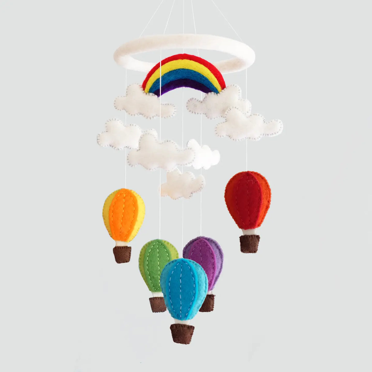 Felt Mobile | Hot Air Balloon nursery decor with colorful wool felt balloons, clouds, and rainbow, handmade for baby gifts.