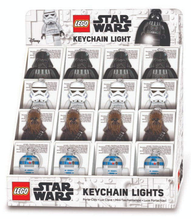 Lego Keylight | Star Wars display box featuring Darth Vader, Stormtrooper, Chewbacca, and R2-D2 keychain lights.