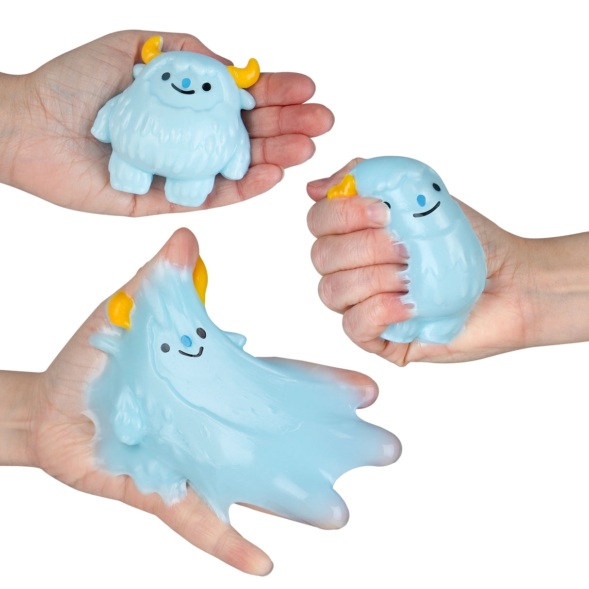 Blue squishy toy characters with yellow horns being stretched and squeezed in hands