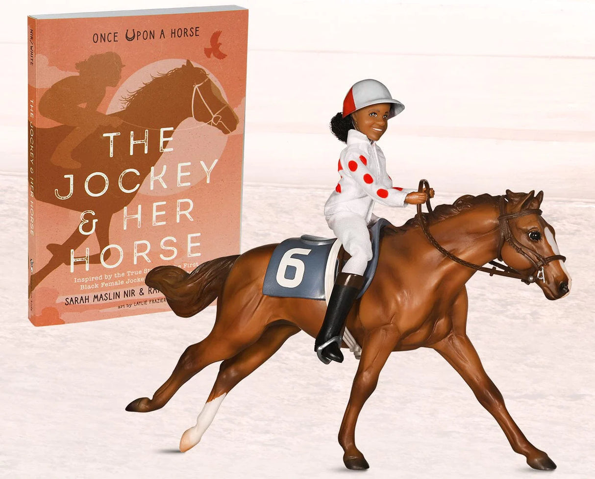 Cheryl White & Jetolara set featuring a Breyer model horse and jockey figure with The Jockey and Her Horse book.