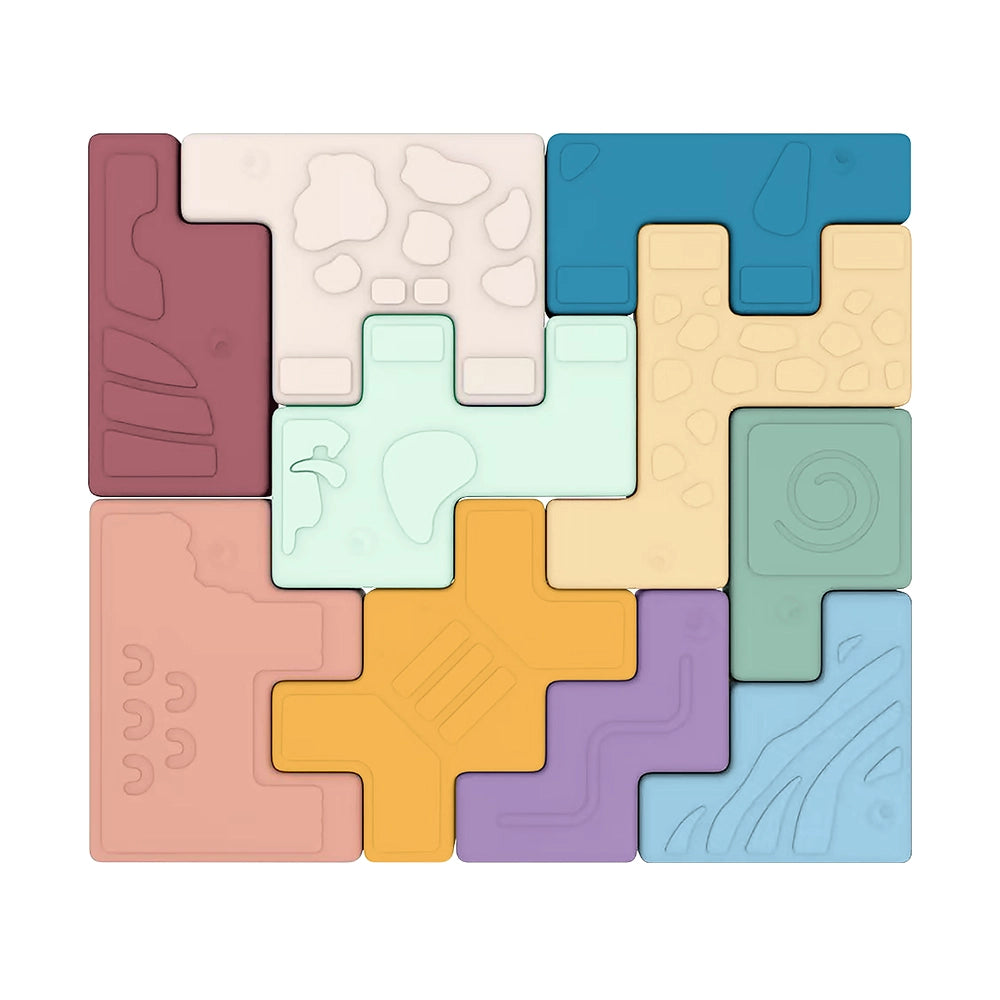 Set of interlocking pastel-colored puzzle pieces with various embossed shapes and textures on white background