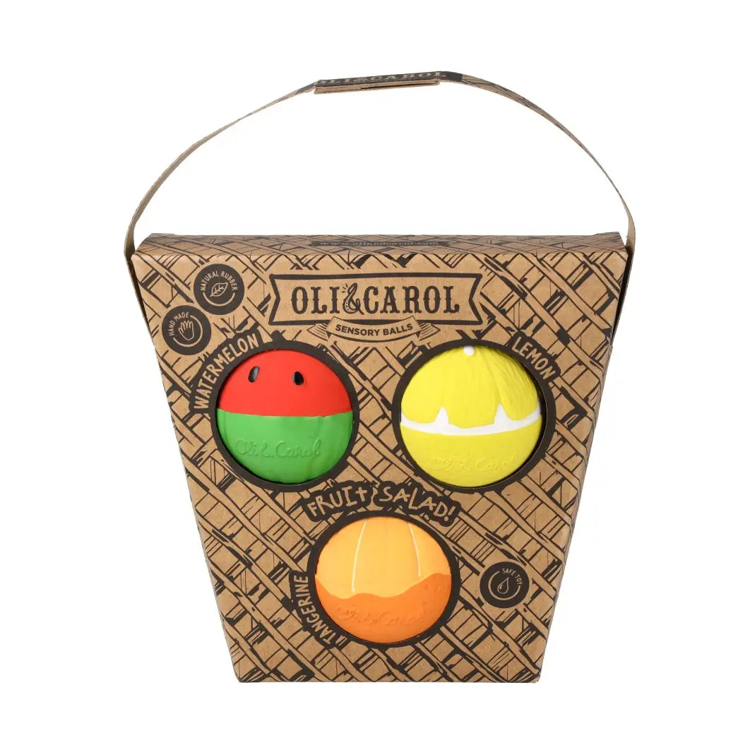 Packaged set of three handmade sensory balls shaped like watermelon, lemon, and tangerine for baby play and teething aid