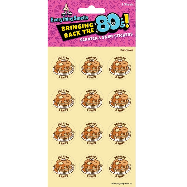 Two sheets of round scratch and sniff stickers featuring stacks of pancakes with syrup and butter from the 80s collection