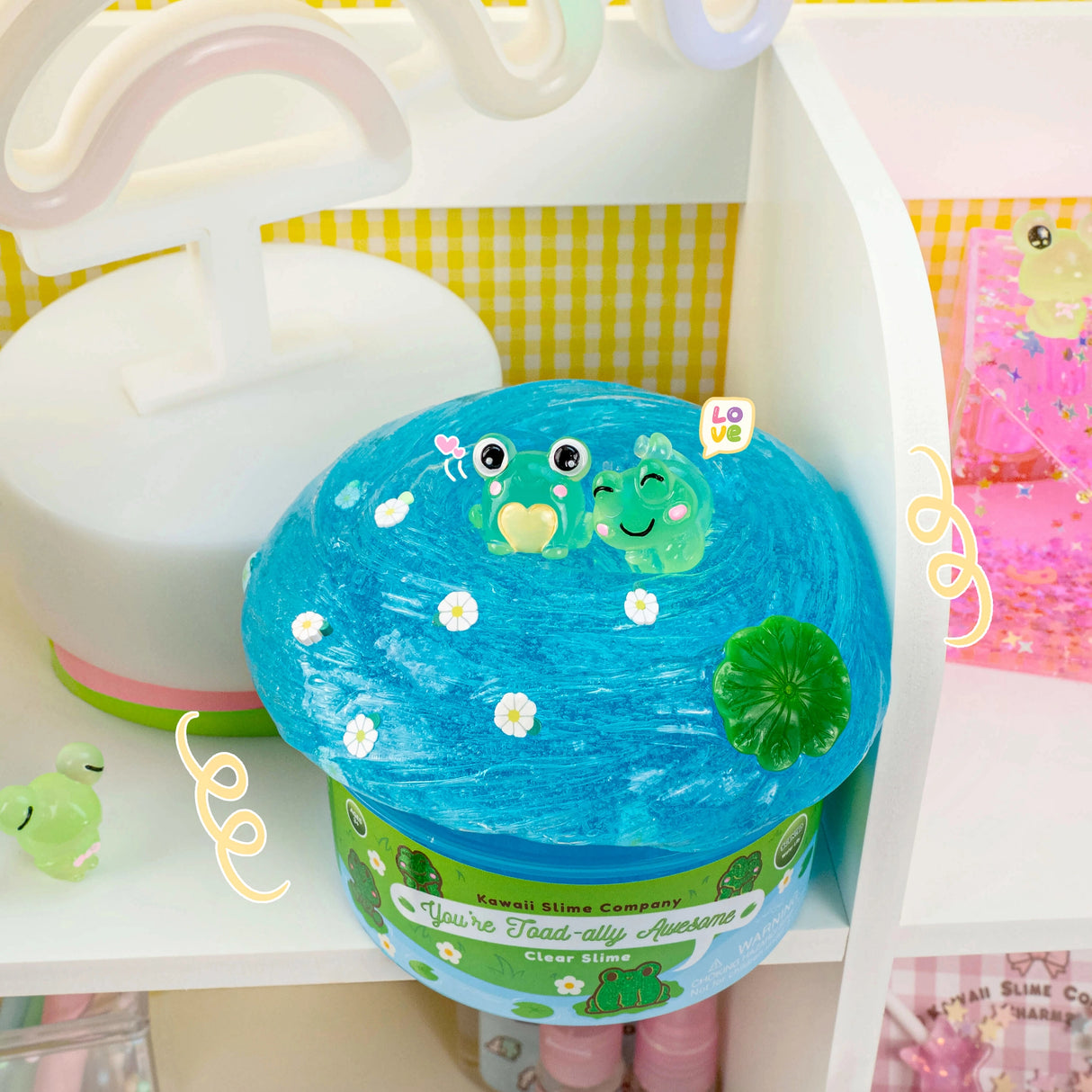 You're Toad-ally Awesome Clear Slime with bright blue color, toad charms, and water lily scent for playful fun.
