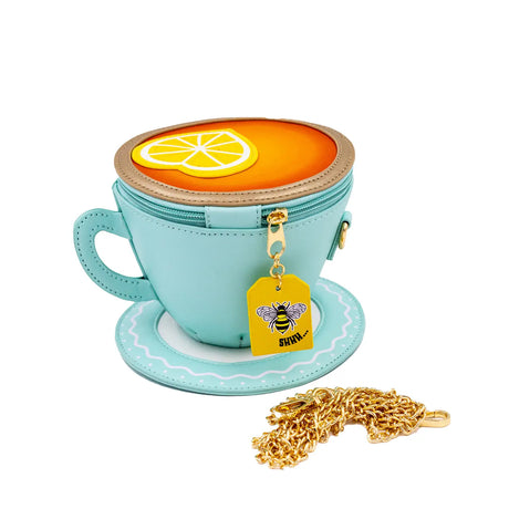 Handbag | Lemon Tea crossbody bag shaped like a whimsical tea cup with lemon design and gold chain strap.
