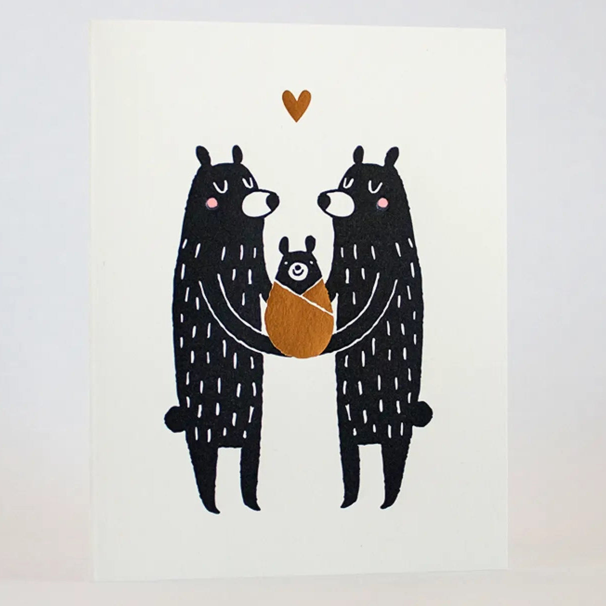 New Baby Black Bears Card showing two parent bears holding a wrapped baby bear with a heart above, letter-pressed by Fugu Fugu!