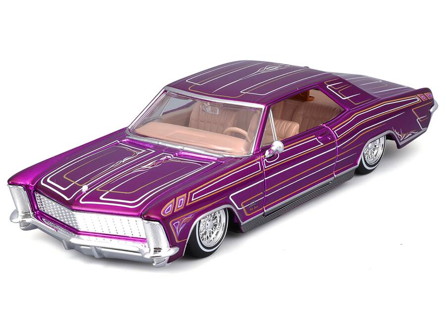 Shiny purple lowrider model car with detailed striped custom paint and chrome wire-spoke wheels on white background