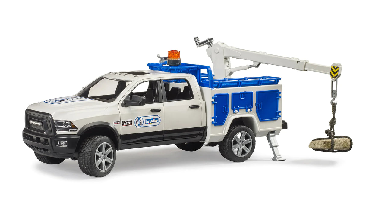 RAM 2500 Service Truck toy with extendable crane, storage compartments, rotating beacon, and tailgate for cargo loading.