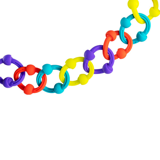 Plip Kit colorful silicone arches and links connected in a chain for creative building and endless fun.