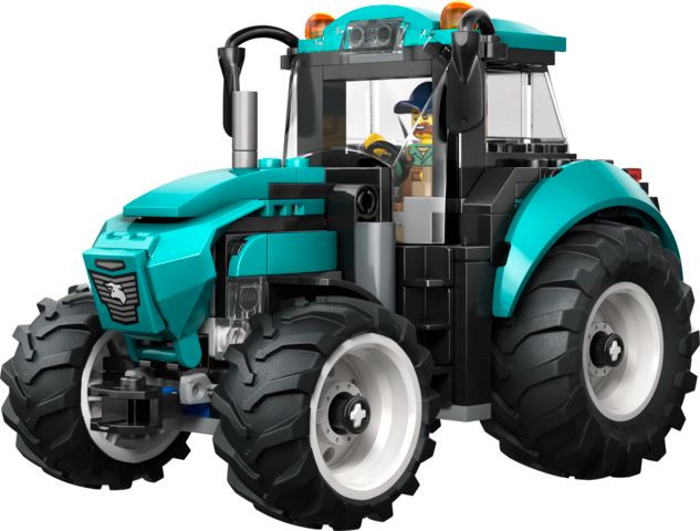 Toy farm tractor model with large rubber tires and a driver figure in a teal and black color scheme