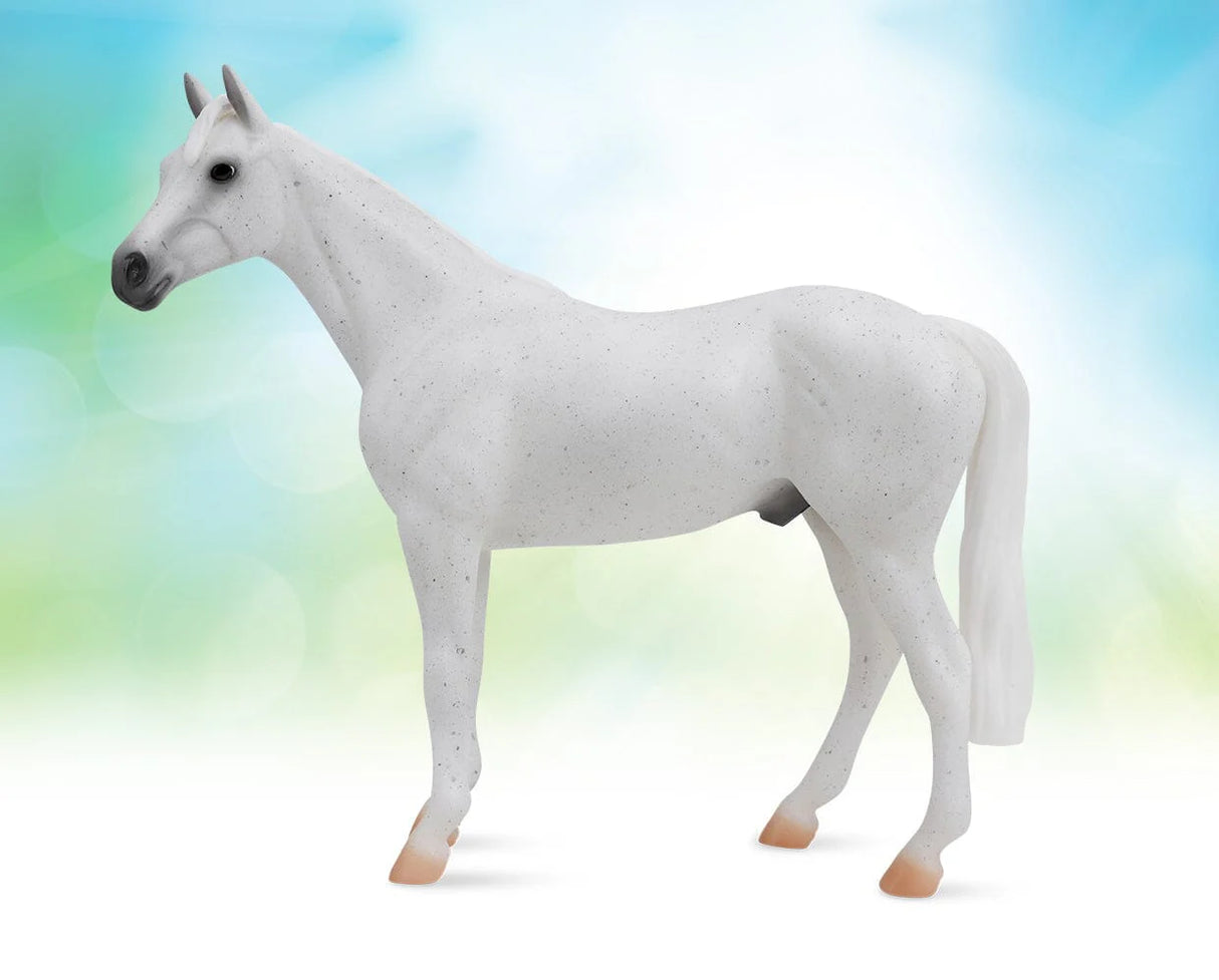 Fleabitten Grey Thoroughbred model horse in 1:12 scale showing athletic build and graceful stance.