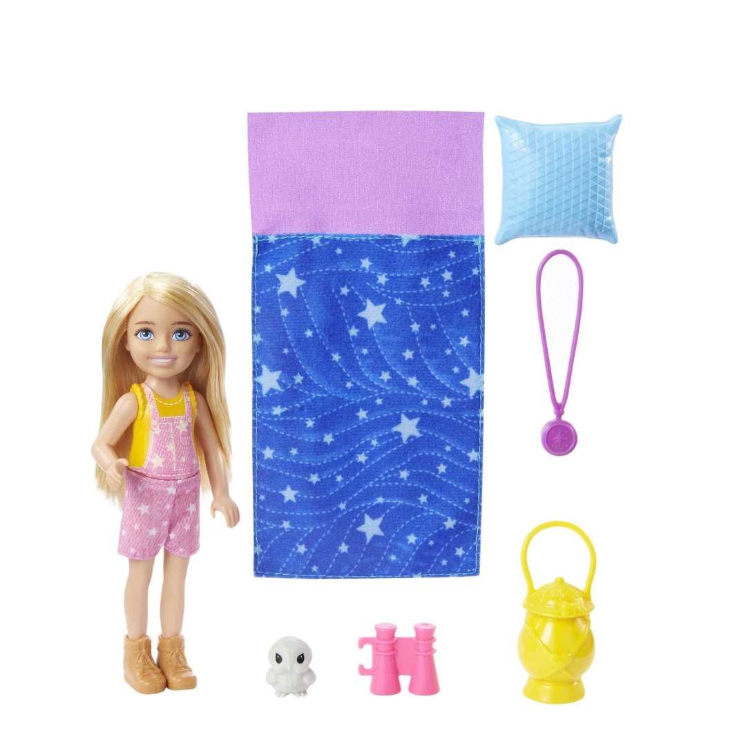 Barbie Chelsea Camping doll with star sleeping bag, pillow, lantern, binoculars, compass, and baby owl toy set.