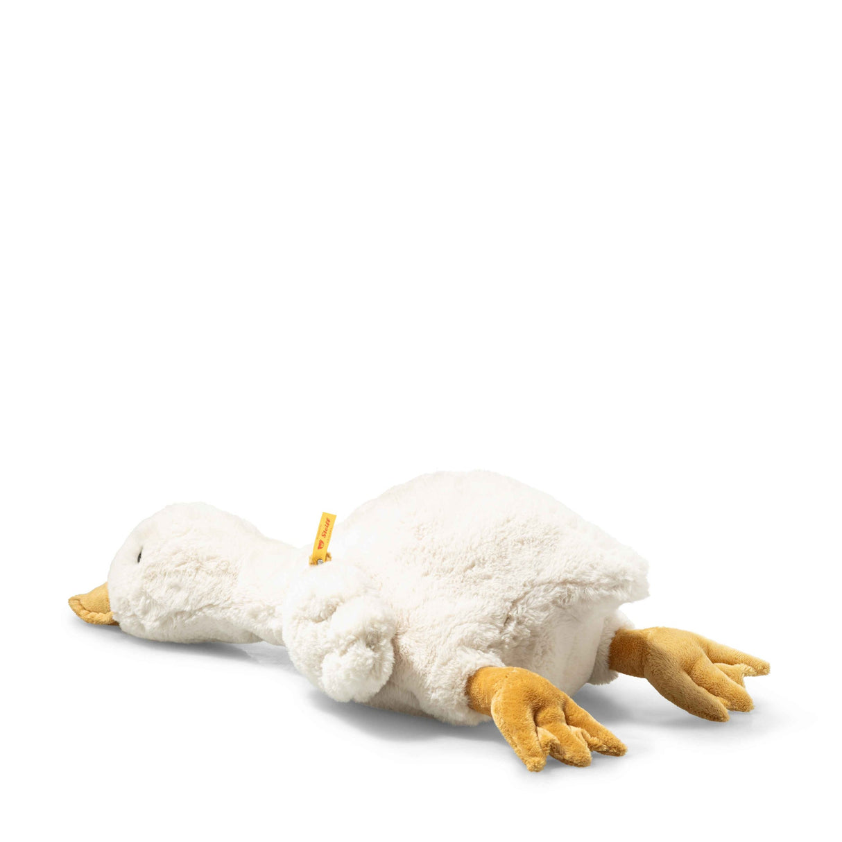 Goose Gilda Large plush toy lying down, soft white feathers and orange beak with weighted belly for stable sitting.