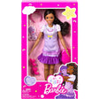 My First Barbie Black Hair doll in lilac dress with pink shoes and headband, designed for easy play and dressing.
