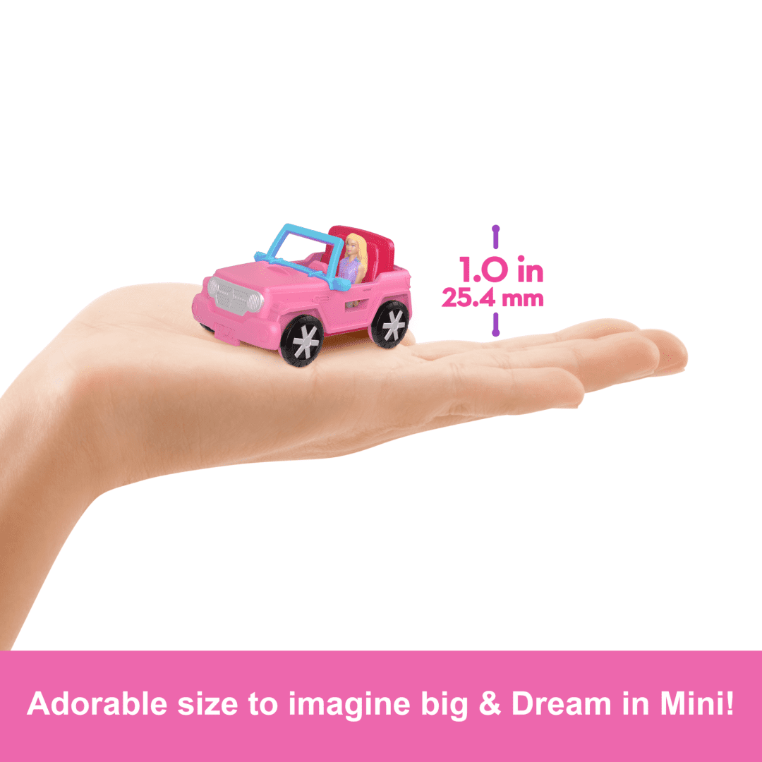 Mini BarbieLand Camping pink mini vehicle with Barbie doll on hand showing size and detail for play or display.