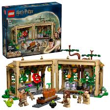 Harry Potter Hogwarts Castle: Herbology Class LEGO set with greenhouse, mandrakes, minifigures, and gardening accessories.