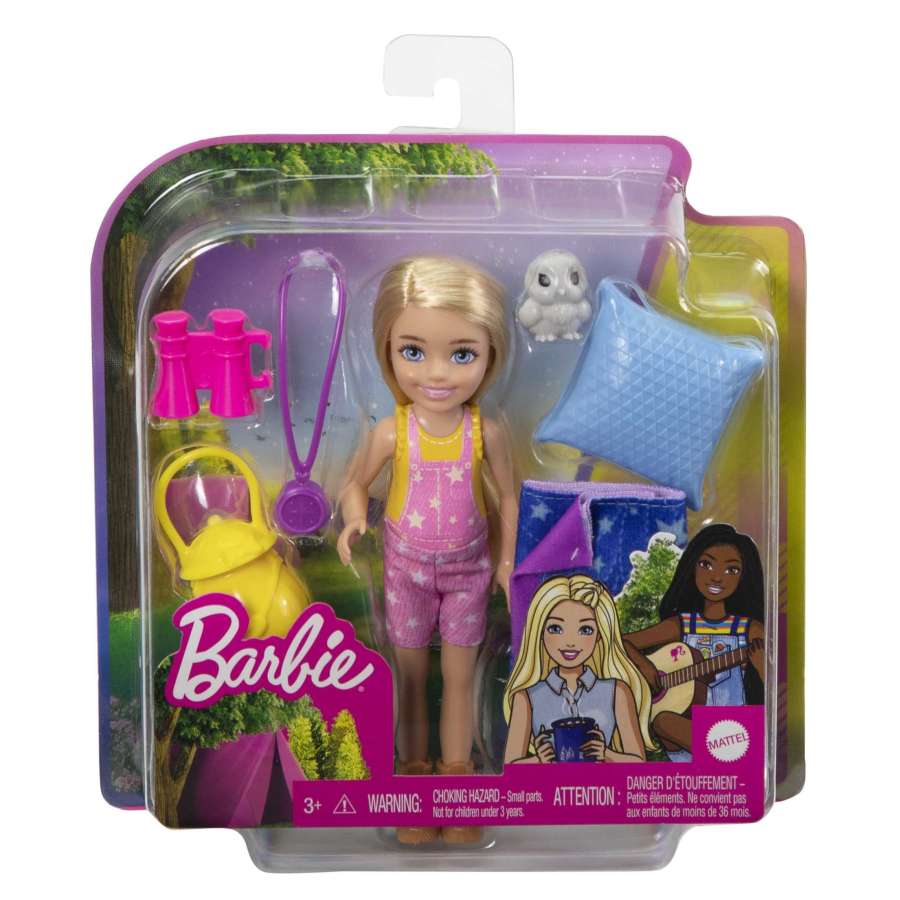 Barbie Chelsea Camping doll playset with owl, binoculars, compass, sleeping bag, pillow, and lantern for outdoor fun.