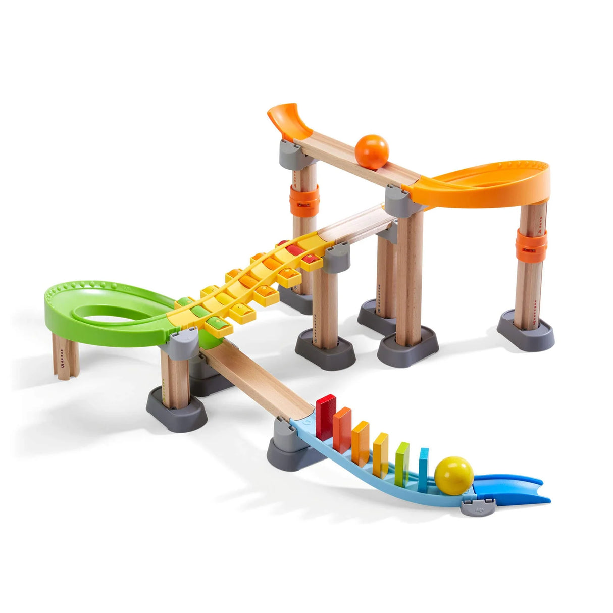 Kullerbu Melody Domino Set with colorful wooden tracks, balls, sound staircase, and domino pieces for creative play.