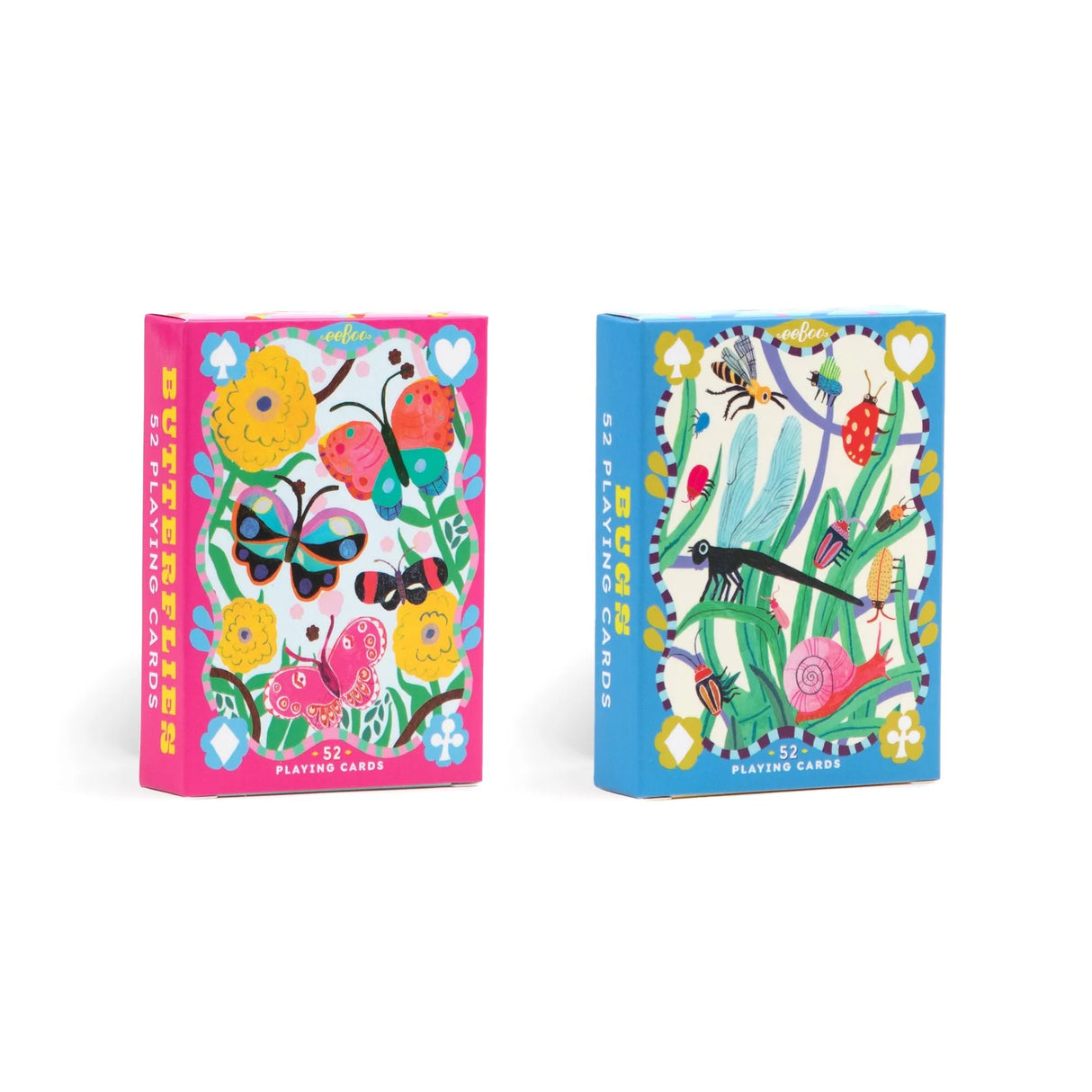 Two colorful playing card boxes with butterfly, bug, and flower illustrations by Monika Forsberg on a white background