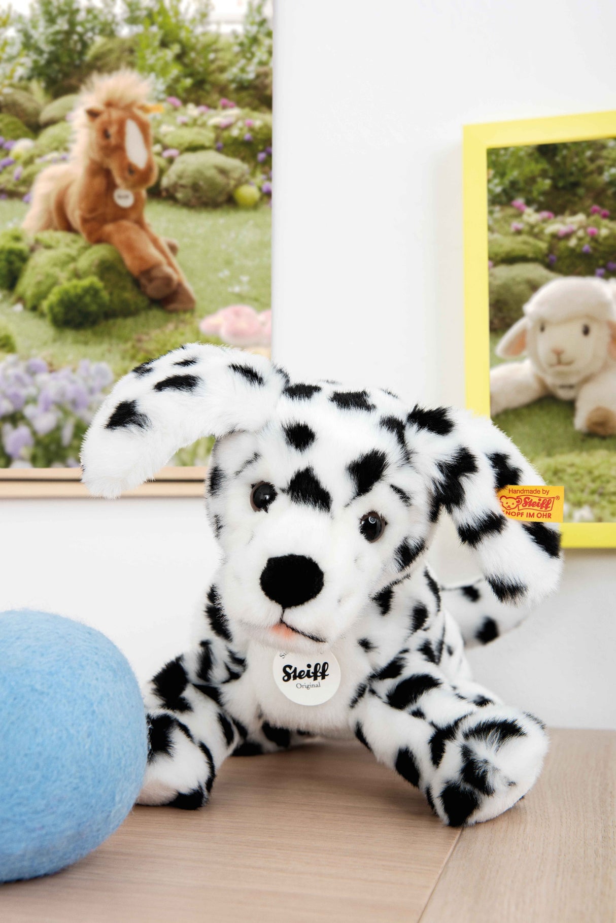 Dalmation Puppy Lupi plush toy with black spots, soft fur, and signature Button in Ear trademark tag.