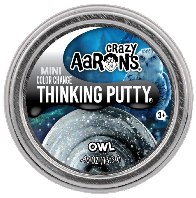 Mini Color Change Owl Thinking Putty in a tin, sparkling silver with color-shifting black to white inspired by snowy owl feathers.