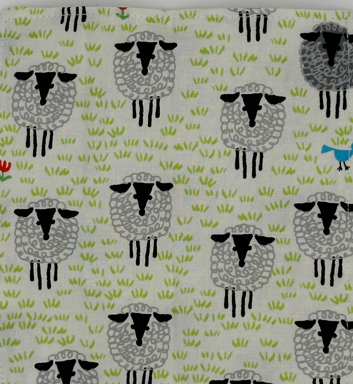 Baby Paper | Organic Sheep features a crinkly organic toy with sheep patterns for baby sensory play.