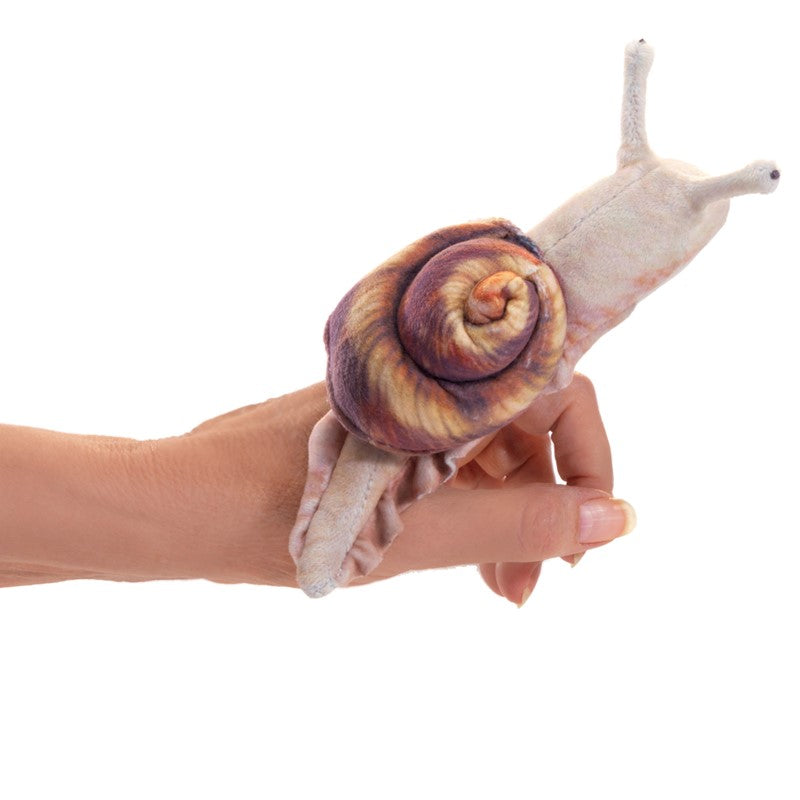 Hand wearing the Snail Finger Puppet with lifelike weighted beads for nature exploration and storytelling fun.