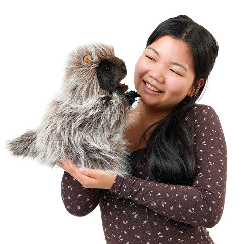 Standing Porcupine Puppet held by a smiling woman