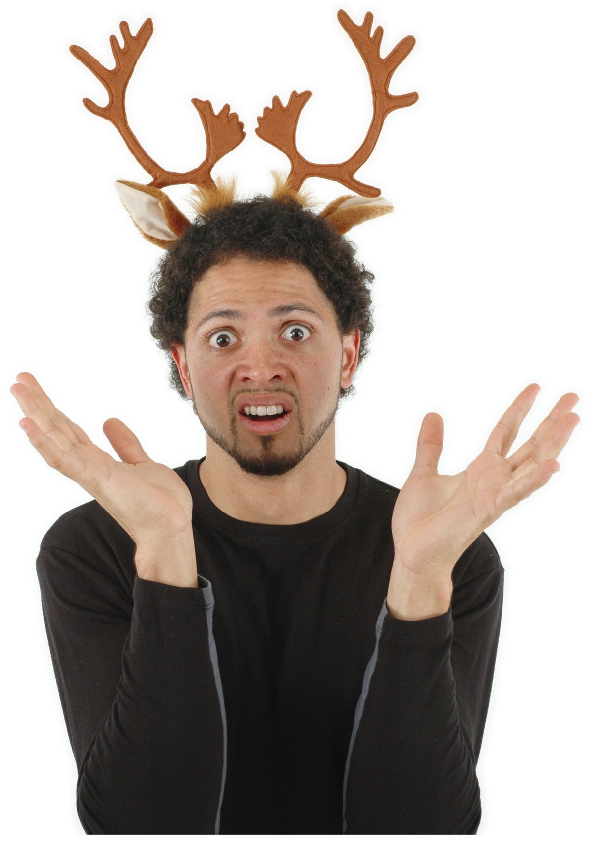 Man wearing Reindeer Antlers headband with brown fuzzy antlers and ears, looking confused and festive.