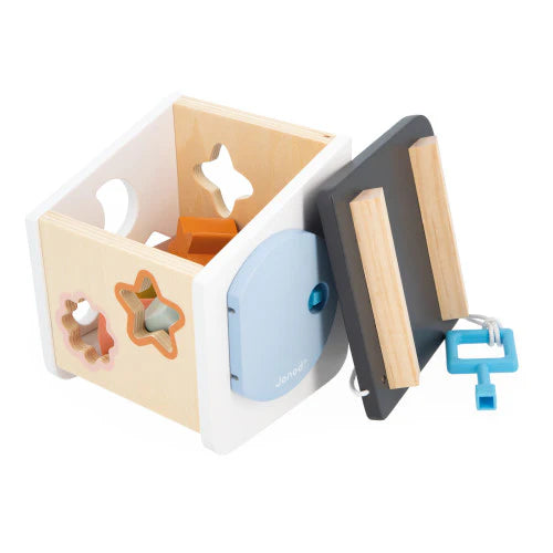 Sweet Cocoon Bird House Shape Sorter wooden toy with colorful shapes, key, and openable roof for toddlers.