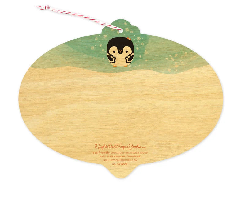 Penguin Ornament Wood Card flat wood holiday card featuring a cute penguin design with string for hanging.
