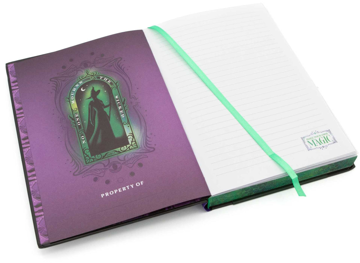Wicked Elphaba Journal open to lined pages with green ribbon bookmark and purple cover design featuring Elphaba silhouette.