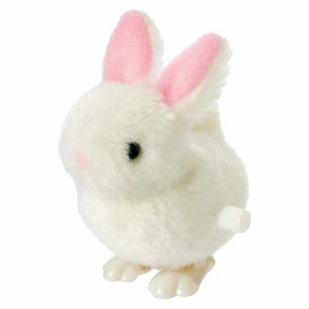 Fuzzy Bunny Wind Up is a cute white fluffy wind-up toy bunny with pink ears, perfect for Easter baskets.