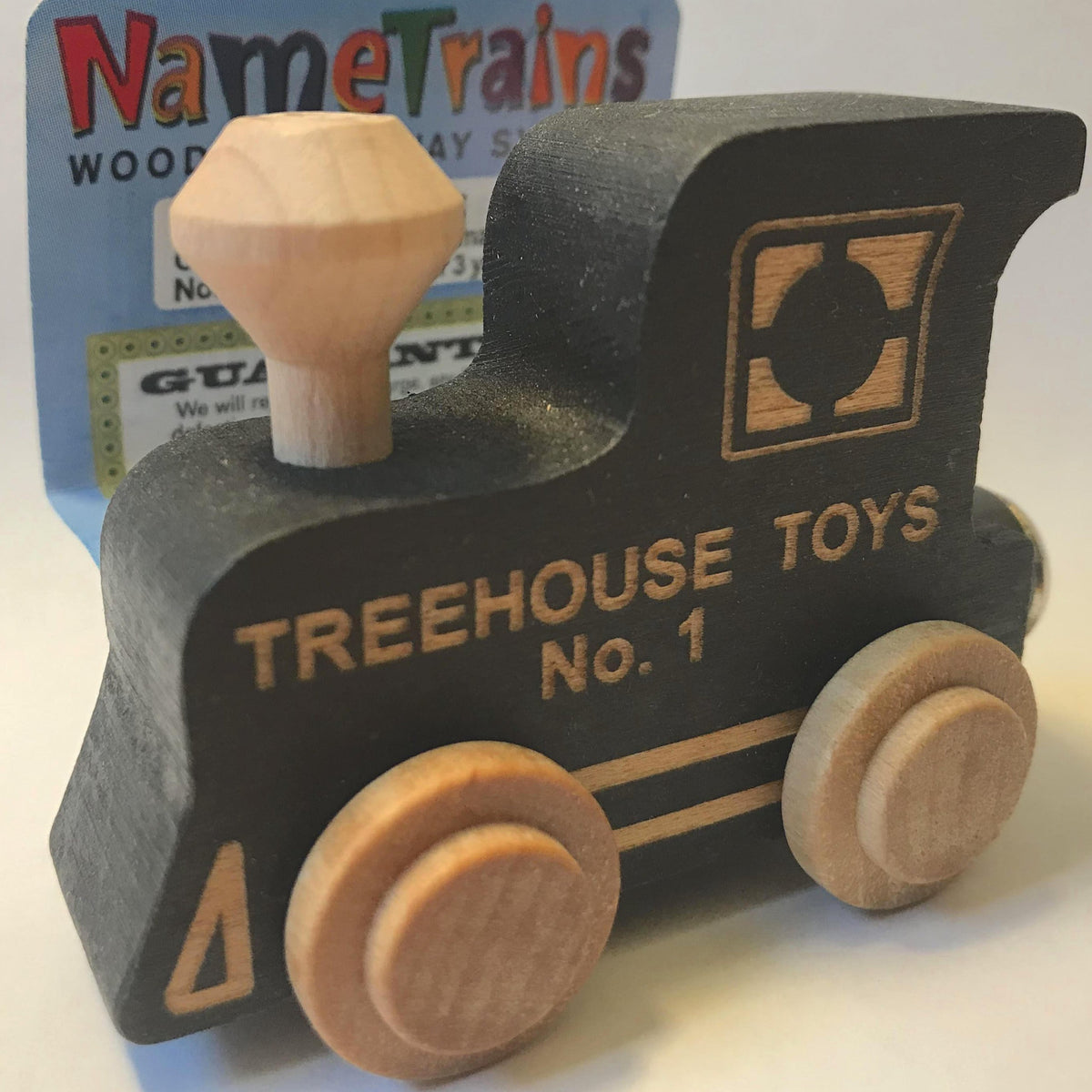 NameTrain Engine Treehouse Toys wooden black engine with natural wheels and chimney for kids' personalized train set.