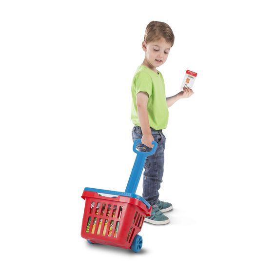 Child playing with Fill & Roll Grocery Basket, pulling the red and blue rolling basket filled with play food boxes.
