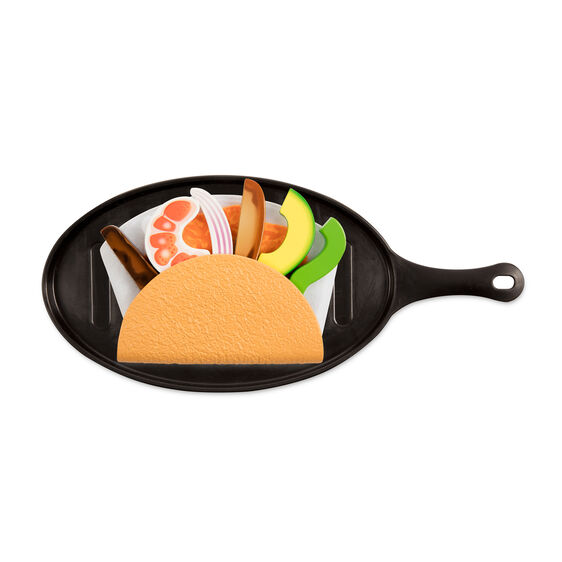 Taco & Torilla Set with sliceable wooden taco ingredients on black skillet for pretend play cooking.