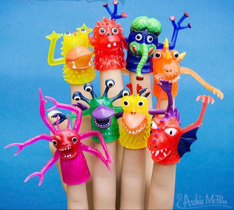 Finger Monster finger puppets showing colorful rubber monsters with flailing arms and big eyes on adult fingers.
