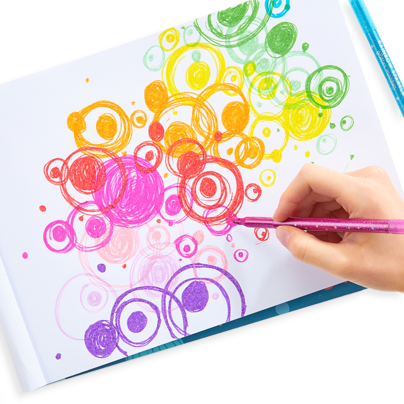 Hand drawing colorful circles with Rainbow Sparkle Glitter Markers on white paper creating vibrant art.