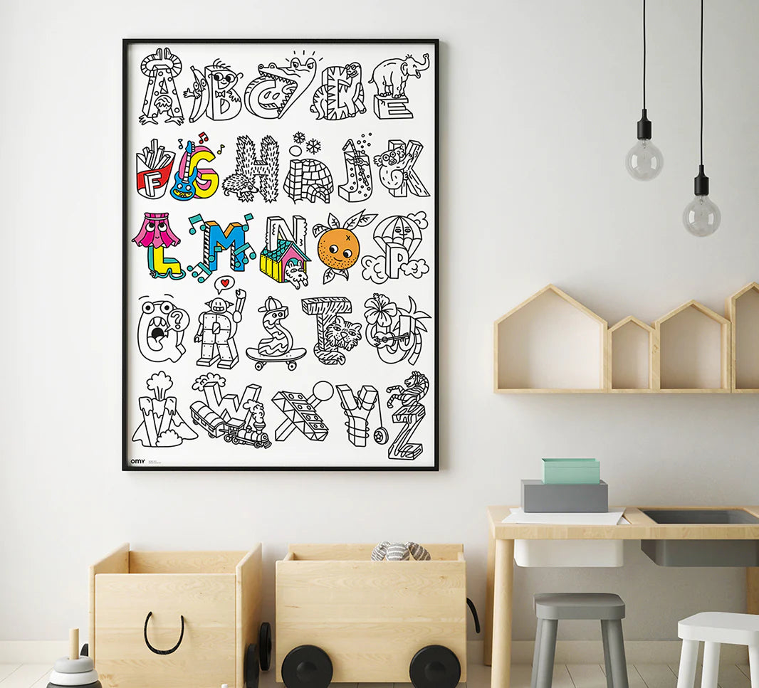 ABC Giant Coloring Poster hanging on a wall, featuring outlined alphabet letters with fun cartoon designs ready to color.